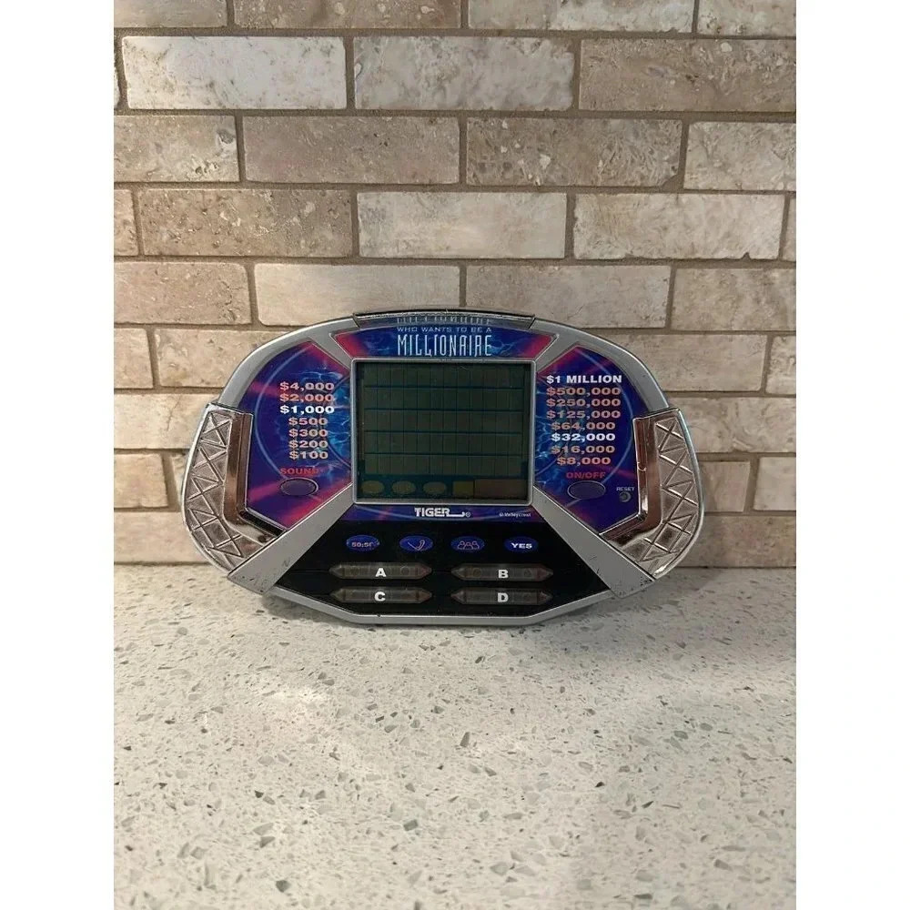 Who Wants To Be A Millionaire Game Electronic Handheld 2000 Tiger bj‎